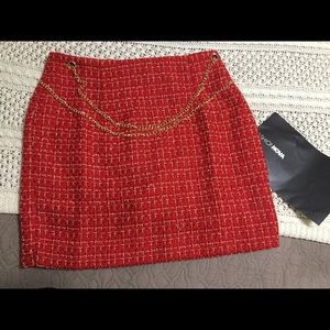 She’s a lady chain skirt